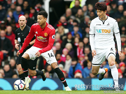 잉글랜드 프리미어리그에서 제시 린가드(사진 왼쪽)를 상대했었던 기성용. 린가드, 기성용은 2024시즌 FC 서울 핵심이다(사진=게티이미지코리아)